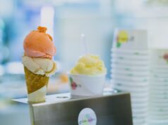 ice cream on cone with gray metallic holder photo